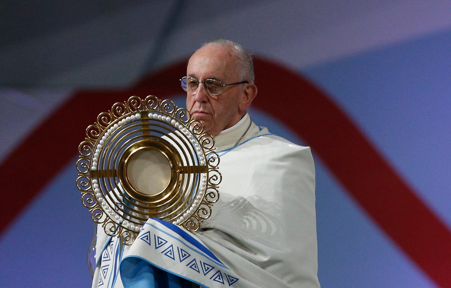 Pope Francis blesses the crowd with the monstrance during the World Youth Day prayer vigil at St. John Paul II Field in Panama City Jan. 26, 2019.